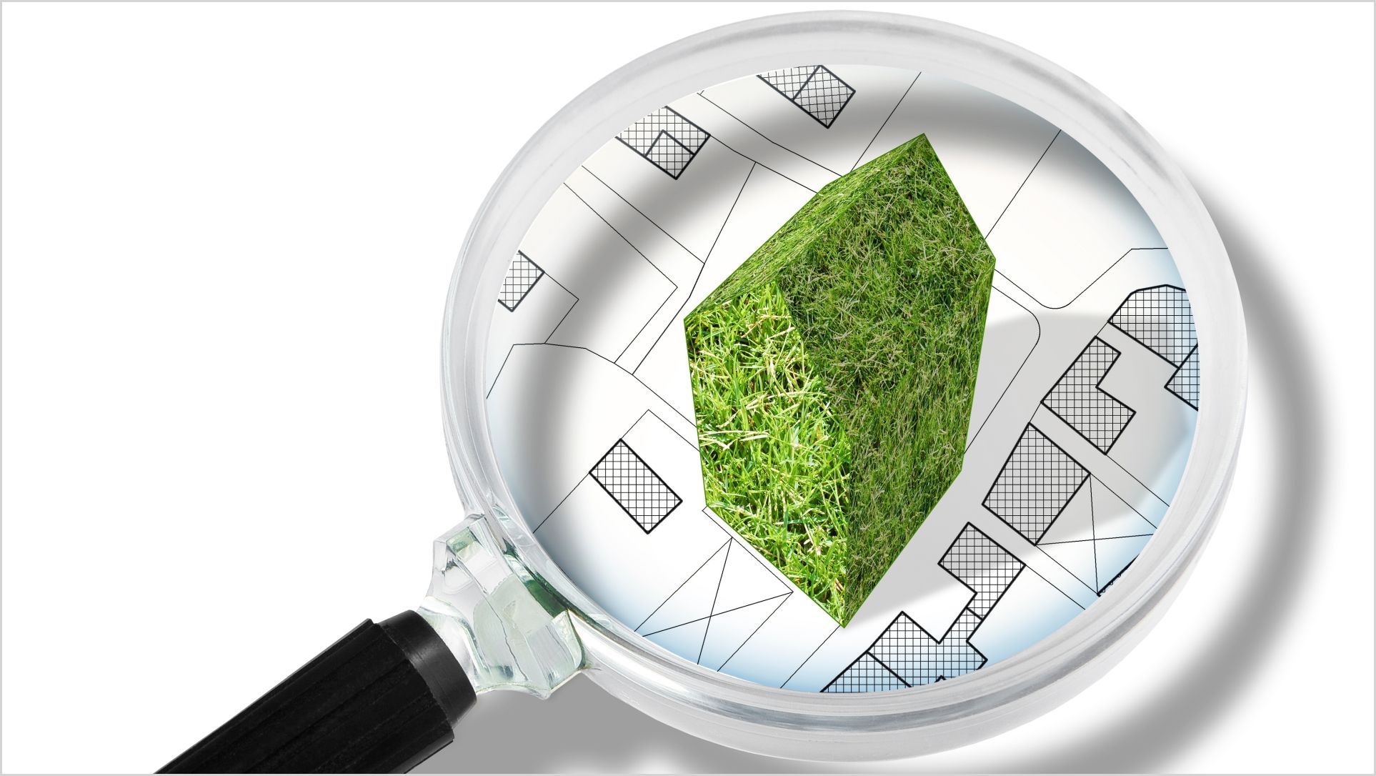 Green building construction plan magnifying glass